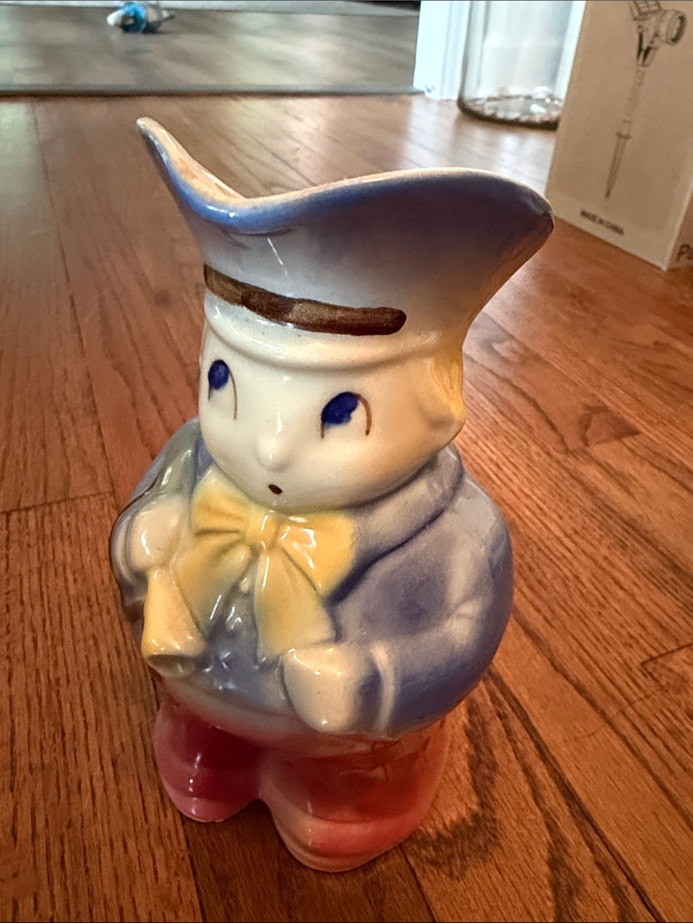Ceramic Vintage-Style Blue and Pink Figurine with Yellow Bow